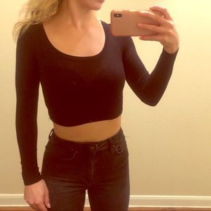 Sexy black, cropped, long sleeve shirt.